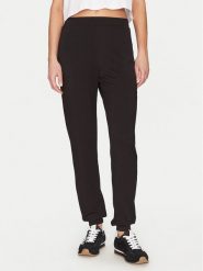Guess Spodnie materiałowe O5GB05 KCQP2 Czarny Regular Fit. Czarne spodnie materiałowe Guess, z aplikacjami, z materiału. Za 129.99 zł.