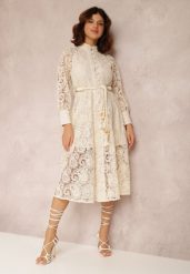 Jasnobeżowa Sukienka Palestra. Brązowe sukienki Renee, na imprezę, m, bez wzorów, z bawełny, boho, bez kołnierzyka, bez ramiączek, midi, gorsetowe. W wyprzedaży za 219.99 zł.