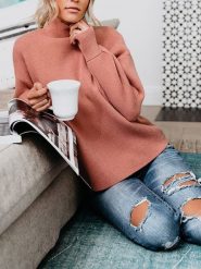 Milan Kiss Sweter w kolorze łososiowym rozmiar: S. Różowe swetry Milan Kiss, s, bez wzorów, bez ramiączek. Za 214.70 zł.