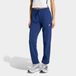Spodnie fitness damskie ADIDAS. Niebieskie spodnie dresowe adidas, bez wzorów, z dresówki, na fitness i siłownię. Za 199.99 zł.