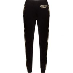 Spodnie MOSCHINO UNDERWEAR. Czarne spodnie dresowe Moschino Underwear, bez wzorów, z bawełny. W wyprzedaży za 523.00 zł.