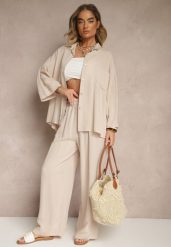 Beżowy Komplet z Wiskozy Spodnie o Szerokim Kroju i Koszula Novesca. Brązowe koszule Renee, bez wzorów, z wiskozy, eleganckie, bez kołnierzyka, bez ramiączek. W wyprzedaży za 111.99 zł.