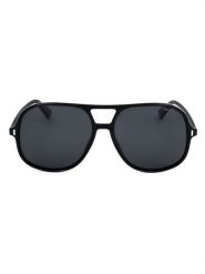 Polaroid Okulary przeciwsłoneczne unisex w kolorze czarnym rozmiar: 57. Czarne okulary przeciwsłoneczne Polaroid, bez wzorów, z tworzywa sztucznego, szklane. Za 164.95 zł.