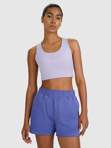 4F Biustonosz treningowy z niskim wsparciem - niebieski XS. Niebieskie biustonosze sportowe 4f, bez wzorów, z elastanu, na fitness i siłownię. Za 89.99 zł.