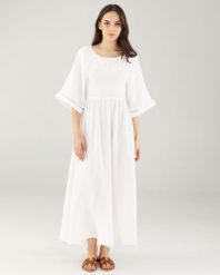 Gładka sukienka z muślinu. Białe sukienki Unisono, l, z aplikacjami, z bawełny, bez kołnierzyka, bez ramiączek, midi, rozkloszowane. Za 329.00 zł.