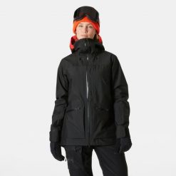 Damska kurtka narciarska Helly Hansen Powderqueen 3.0. Czarne kurtki narciarskie Helly Hansen, na zimę, bez wzorów, bez kaptura, narciarskie. W wyprzedaży za 1,676.50 zł.