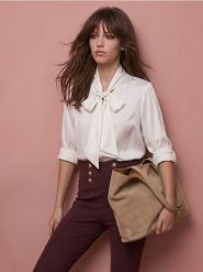 Legginsy z przeszyciami i ozdobnymi guzikami z wiskozą - czerwony. Czerwone legginsy Sinsay, bez wzorów, z wiskozy. Za 49.99 zł.