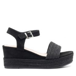 Sandały Jenny Fairy. Czarne sandały Jenny Fairy, bez wzorów, bez obcasa, na koturnie, bez zapięcia. Za 139.99 zł.