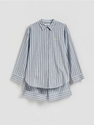 Popelinowa piżama w paski - jasnoniebieski. Niebieskie piżamy Reserved, l, bez wzorów, z bawełny, bez kołnierzyka, bez ramiączek. Za 139.99 zł.