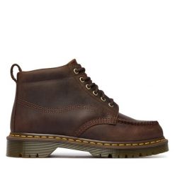 Trzewiki Dr. Martens. Brązowe botki Dr Martens, bez wzorów, bez obcasa, na płaskiej podeszwie, bez zapięcia. Za 989.99 zł.
