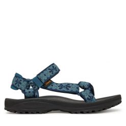 Sandały Teva. Niebieskie sandały Teva, bez wzorów, bez obcasa, na płaskiej podeszwie, bez zapięcia. Za 309.99 zł.