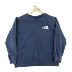 Sweter damski The North Face granatowy. Niebieskie swetry The North Face, l, bez wzorów, z materiału, eleganckie, bez ramiączek. Za 106.46 zł.