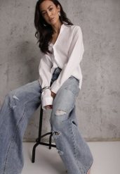 Niebieskie Szerokie Jeansy Palazzo z Bawełny z Dziurami i Przetarciami Erilenna. Niebieskie jeansy Renee, bez wzorów, z bawełny, eleganckie, z podwyższonym stanem. Za 139.99 zł.