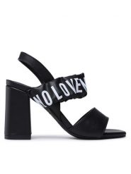 LOVE MOSCHINO Sandały JA16358G0GIE0000 Czarny. Czarne sandały Love Moschino, bez wzorów, ze skóry, bez obcasa, na słupku, bez zapięcia. Za 1,099.00 zł.