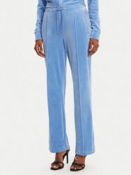 Juicy Couture Spodnie dresowe Tina JCAPW045 Niebieski Regular Fit. Niebieskie spodnie dresowe Juicy Couture, bez wzorów, z dresówki. Za 249.99 zł.