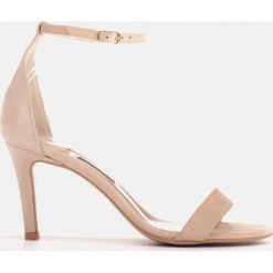 Marco Shoes Eleganckie sandały z naturalnego zamszu beżowy. Brązowe sandały bez wzorów, eleganckie, bez obcasa, bez zapięcia. Za 339.00 zł.