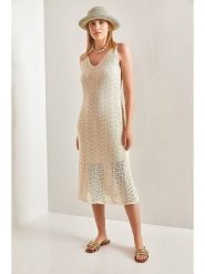 Bianco Lucci Sukienka dzianinowa w kolorze beżowym rozmiar: onesize. Brązowe sukienki Bianco Lucci, bez wzorów, z dzianiny, bez kołnierzyka, bez ramiączek, midi. Za 56.93 zł.