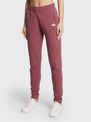The North Face Spodnie dresowe W Nse NF0A55GS Bordowy Slim Fit. Czerwone spodnie dresowe The North Face, bez wzorów, z bawełny. Za 209.99 zł.