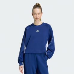 Bluza Stadium z zaokrąglonym dekoltem i 3 paskami. Niebieskie bluzy bez kaptura adidas, m, bez wzorów, z bawełny, bez kaptura. Za 259.00 zł.