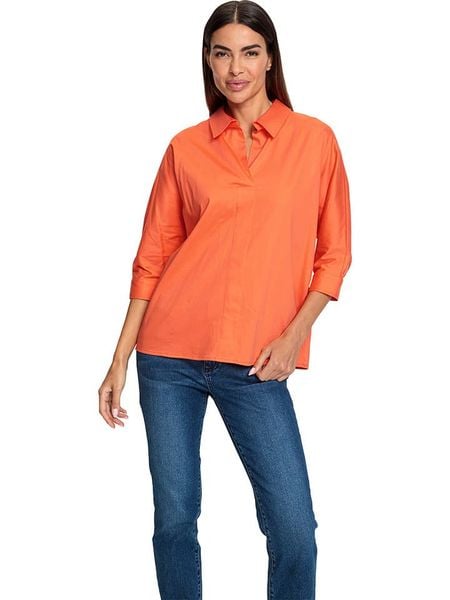 Heine Bluzka w kolorze pomarańczowym rozmiar: 42. Pomarańczowe bluzki Heine, bez wzorów, bez kołnierzyka, bez ramiączek. Za 116.95 zł.