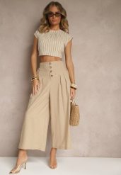 Ciemnobeżowe Spodnie Culottes High Waist z Bawełny Zdobione Guzikami Izuma. Brązowe jeansy Renee, z aplikacjami, z bawełny, eleganckie, z podwyższonym stanem. W wyprzedaży za 75.99 zł.