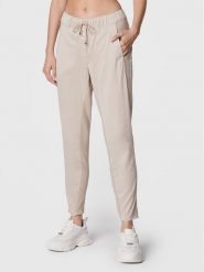 Marc Aurel Spodnie materiałowe 1615 2300 93133 Beżowy Loose Fit. Brązowe spodnie materiałowe Marc Aurel, bez wzorów, z bawełny. Za 829.99 zł.