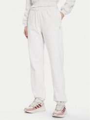 Under Armour Spodnie dresowe Ua Icon 6003676 Écru Loose Fit. Spodnie dresowe Under Armour, bez wzorów, z dresówki. Za 269.99 zł.