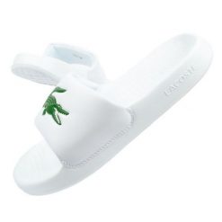 Klapki Lacoste Serve Slide W 02082 białe. Białe klapki bez wzorów, z syntetyku, sportowe, bez obcasa, bez zapięcia. Za 347.21 zł.