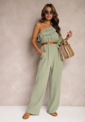 Zielony Bawełniany Kombinezon o Asymetrycznym Kroju z Gumką w Talii i Falbaną Begelia. Zielone sukienki Renee, l, bez wzorów, z bawełny, klasyczne, z asymetrycznym kołnierzem, bez ramiączek, asymetryczne. Za 159.99 zł.