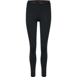 Legginsy termoaktywne damskie Hummel First Performance Women Tights. Czarne legginsy Hummel, bez wzorów, sportowe. W wyprzedaży za 133.50 zł.