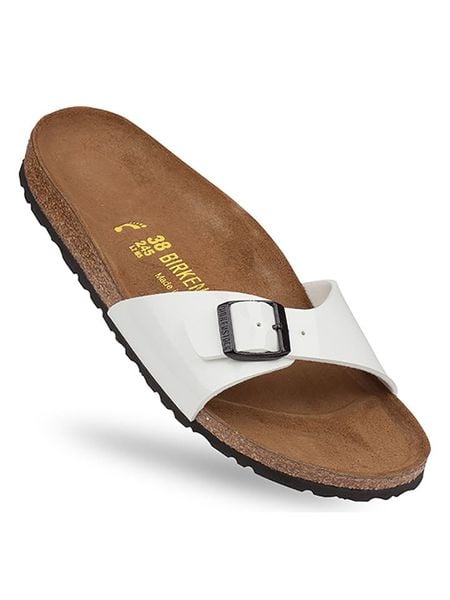 Birkenstock Klapki "Madrid" w kolorze białym rozmiar: 41. Białe klapki Birkenstock, bez wzorów, klasyczne, z otwartym noskiem, bez obcasa, bez zapięcia. Za 218.05 zł.