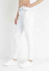 Jasnoniebieskie Jeansy Skinny Adile. Niebieskie jeansy Born2be, l, bez wzorów, z jeansu. W wyprzedaży za 84.99 zł.