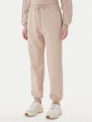 Guess Spodnie dresowe V5BB23 KCX22 Beżowy Regular Fit. Brązowe spodnie dresowe Guess, z aplikacjami, z dresówki. Za 479.99 zł.