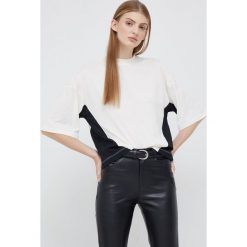 Sisley t-shirt damski kolor beżowy. Brązowe t-shirty Sisley, l, bez wzorów, bez kołnierzyka, bez ramiączek. W wyprzedaży za 109.99 zł.