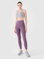 4F Legginsy treningowe ze średnim stanem damskie - fioletowe XS. Fioletowe legginsy 4f, bez wzorów, z dzianiny, sportowe. Za 119.99 zł.