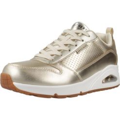 Kapcie SKECHERS UNO - METALLIXS Złoty. Żółte kapcie Skechers, bez wzorów, ze skóry. Za 342.99 zł.