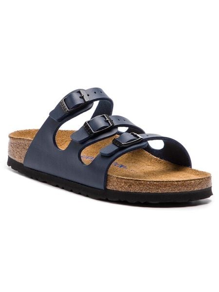 Birkenstock Klapki Florida Bs 0554713 Granatowy. Niebieskie klapki Birkenstock, bez wzorów, ze skóry, bez obcasa, bez zapięcia. Za 399.99 zł.
