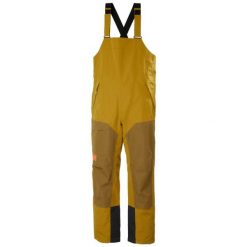 Damski kombinezon narciarski Helly Hansen Emiko Shell Bib. Brązowe kombinezony Helly Hansen, bez wzorów, sportowe, bez kołnierzyka, bez ramiączek. Za 1,105.60 zł.