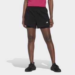 AEROREADY Made for Training Minimal Two-in-One Shorts. Białe szorty adidas, bez wzorów, z materiału, sportowe. Za 169.55 zł.