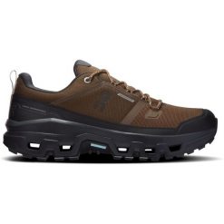 Buty damskie On Cloudrock Low Waterproof. Czarne buty trekkingowe On, bez wzorów, z gumy, bez zapięcia, trekkingowe. Za 909.99 zł.