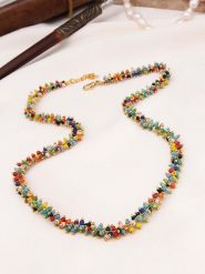 Pierres delicates Pozłacany naszyjnik z elementami ozdobnymi - dł. 45 cm rozmiar: onesize. Żółte naszyjniki Pierres delicates, z materiału, z perłą, pozłacane. Za 43.99 zł.