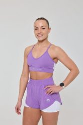 Spodenki do biegania 2 w 1 Elite - fioletowe. Fioletowe szorty sportowe OOSC, bez wzorów, z materiału, z podwyższonym stanem, do biegania. Za 171.99 zł.