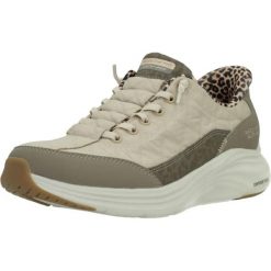 Buty SKECHERS 183015 Beżowy. Brązowe buty do biegania Skechers, bez wzorów, z materiału, bez zapięcia, do biegania. Za 355.99 zł.