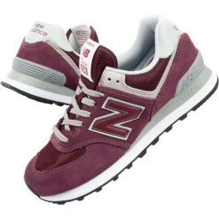 Buty sportowe New Balance W WL574ER fioletowe. Fioletowe buty do biegania New Balance, bez wzorów, z materiału, bez zapięcia, do biegania, New Balance 574. Za 358.88 zł.