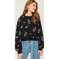 Bluza z nadrukiem all over - Czarny. Bluzy marki Sinsay. W wyprzedaży za 29.99 zł.
