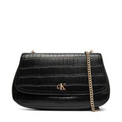 Torebka Calvin Klein. Czarne kopertówki Calvin Klein, bez wzorów, wizytowe, bez dodatków. Za 559.99 zł.
