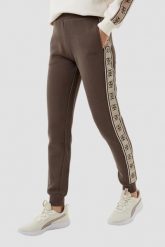 GUESS Brązowe damskie spodnie dresowe Britney Jogger, Rozmiar XS. Brązowe spodnie dresowe Guess, z aplikacjami, z bawełny, długie. W wyprzedaży za 322.99 zł.