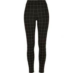 Damskie klasyczne legginsy miejskie z wysoką talią. Białe legginsy Urban Classics, bez wzorów, z elastanu, klasyczne. Za 127.20 zł.