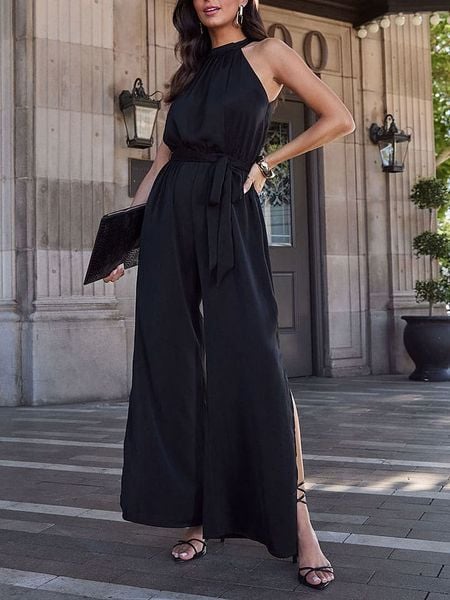 Milan Kiss Kombinezon w kolorze czarnym rozmiar: M. Czarne kombinezony Milan Kiss, m, bez wzorów, z tkaniny, bez kołnierzyka, bez ramiączek. Za 170.87 zł.