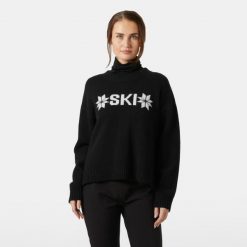 Damski sweter z dzianiny Helly Hansen Bliss. Czarne swetry Helly Hansen, na zimę, bez wzorów, z dzianiny, sportowe, bez ramiączek. Za 710.00 zł.